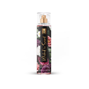 Wicked in Secret Melano Body Splash bottle with floral design and text on a white background