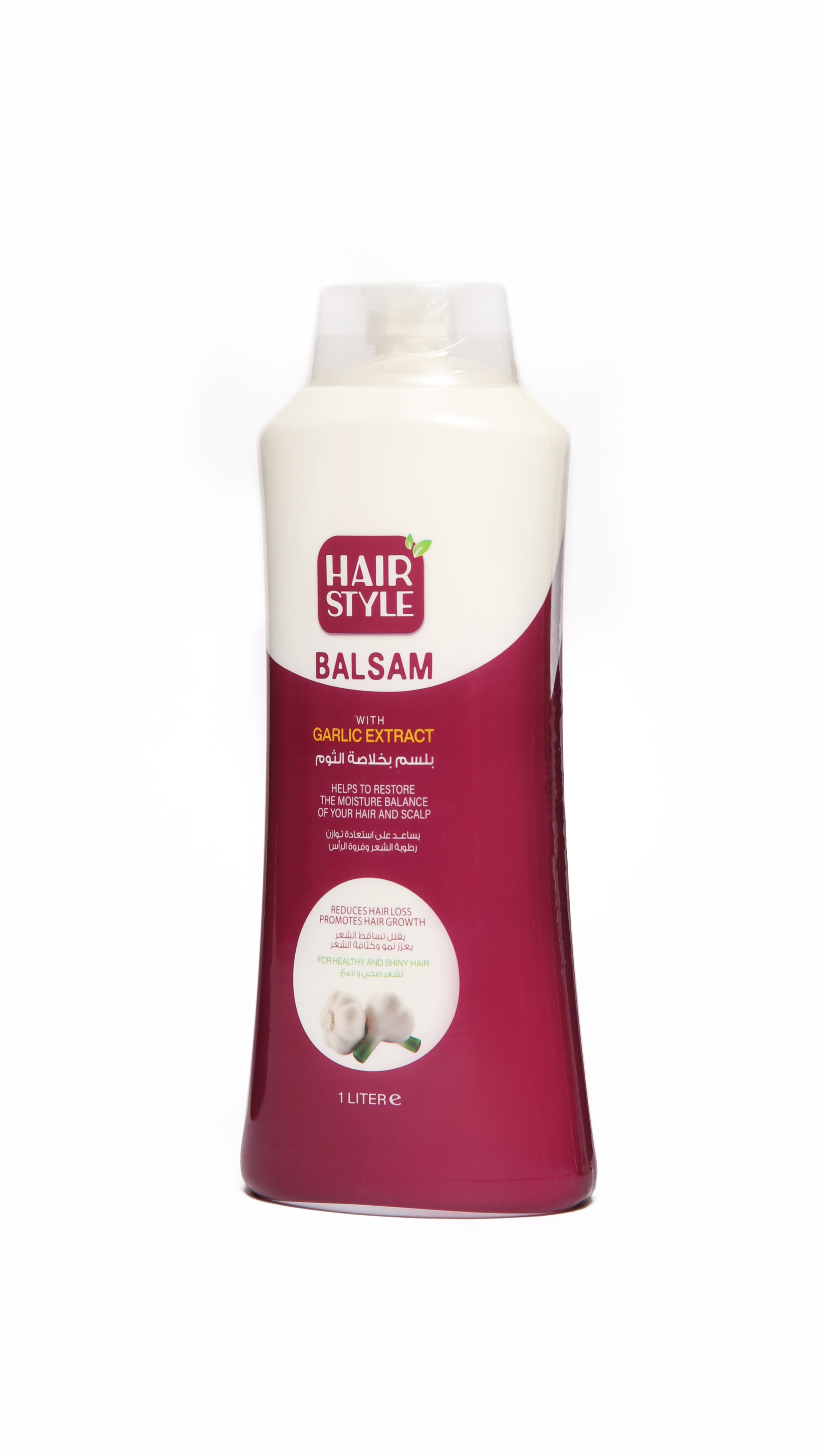 A bottle of hair style balsam with garlic extract, 1000 ml with a white and pink label.