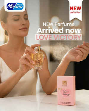 Woman holding a perfume bottle with packaging labeled 'Love Victory' by Melano.